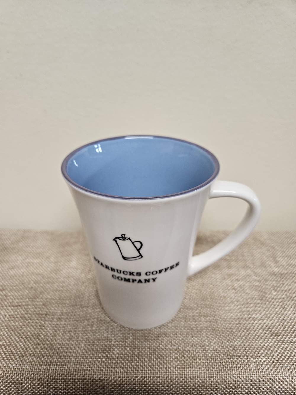 2006 Starbucks Ceramic Coffee Mug with Black Logo Blue Interior & Purple Rim